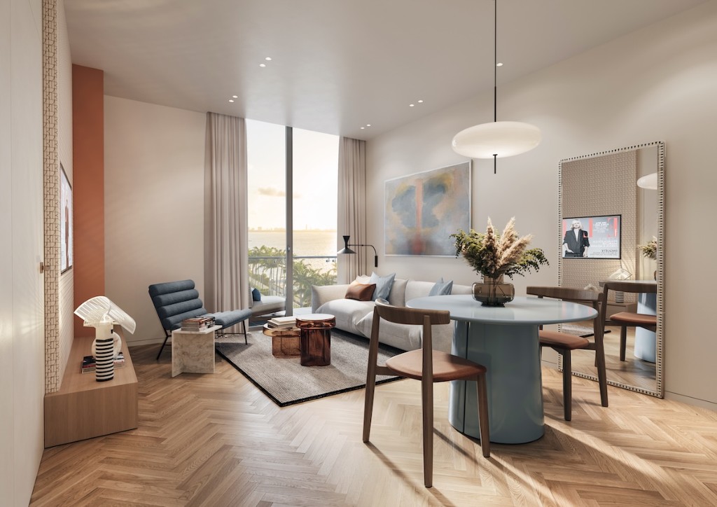 ELLE Residences Miami oturma alanı — körfez manzaralı editöryel iç tasarım